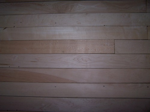 A close up of the sanded floor.